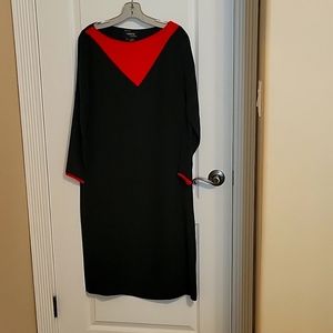 100%silk  sheath dress blk and red with matching belt. Easy fit and flattering.